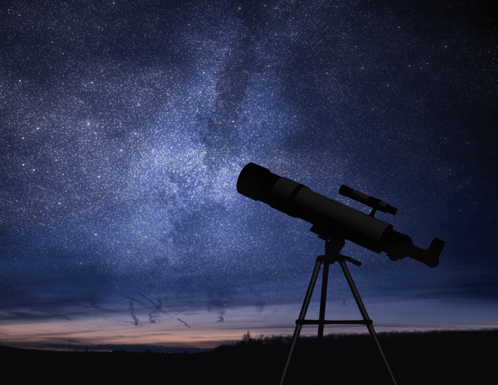 Telescope Tilts Toward The Starry Night Sky
