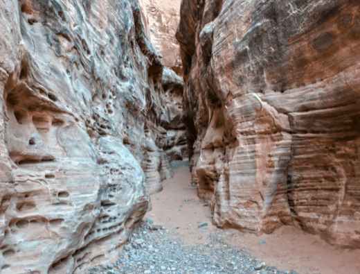 Two White Sandstone Rocks Open Into A Slot Canyon